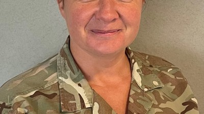 Staff Sergeant Andrea Pearson, RLC, receives the Queen's Commendation for Valuable Service.